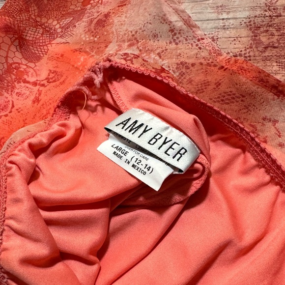Salmon colored skirt size 12/14 by Amy Byer. Sheer print overr polyester slip. - Picture 3 of 3
